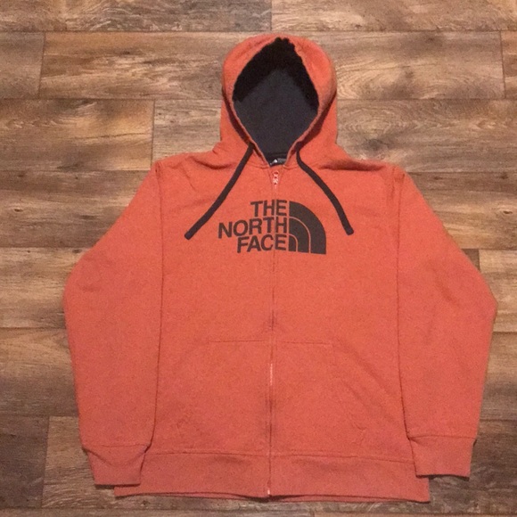 orange and black north face